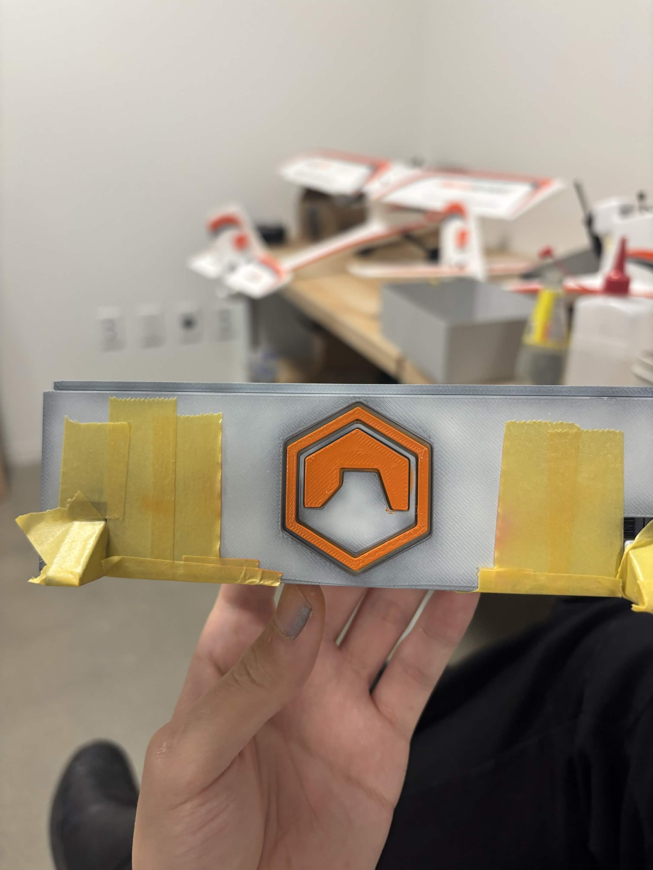 Painting the logo on the inverted pendulum enclosure
